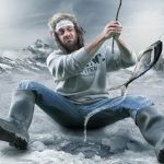 A man on the ice fishing